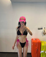 Hot pink colored string bikini