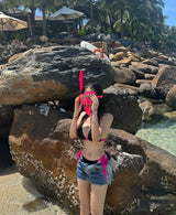 Hot pink colored string bikini