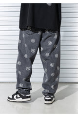 スマイルパターンデニムパンツ/SMILE PATTERN DENIM PANTS (BLACK)