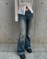 Scratch boots cut denim pants