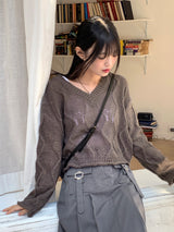 サイレンウェーブパンチングレイヤードVネッククロップドロングスリーブニットウェア
