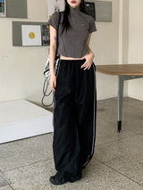 エベルサイドラインワイドロングツーウェイジョガーパンツ / Ebel sideline wide long two-way jogger pants