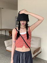 サリーボタンパンチングレイヤードニットノースリーブ / Sally button punching layered knit sleeveless
