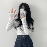 エクステンデッドスリーブラウンドネックTシャツ