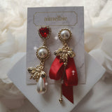 The Royal Red Queen Bee Piercing