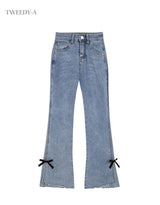 Tiny ribbon point bootcut medium blue denim pants