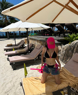 Hot pink colored string bikini