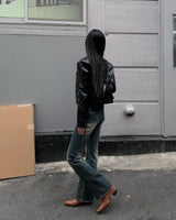 Spotted boots cut pants