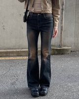 Spotted boots cut pants