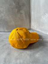 Yellow lettering ball cap