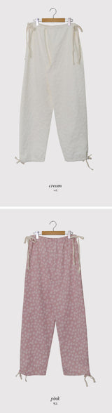 フラワーエンボスストリングワイドジョガーパンツ