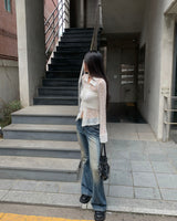 Scratch boots cut denim pants