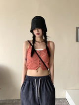 サリーボタンパンチングレイヤードニットノースリーブ / Sally button punching layered knit sleeveless