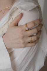 パールポイントドロップチェーンシュガーリング/Pearl point drop chain surgical ring