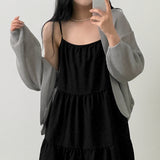 [Adjusting the strap] cancan sleeveless dress
