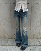 Scratch boots cut denim pants