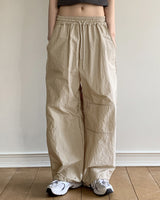 ピディナイロンスリット2ウェイロングワイドジョガーパンツ / Pidi Nylon Slit Two-Way Long Wide Jogger Pants