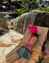 Hot pink colored string bikini