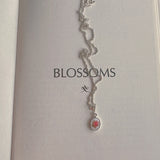 Tiny pink rose necklace
