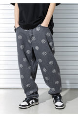 スマイルパターンデニムパンツ/SMILE PATTERN DENIM PANTS (BLACK)