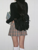 Black round pocket backpack