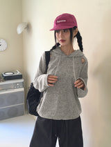 Onbi shoulder slit string boxy long sleeve hooded t-shirt