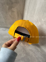 Yellow lettering ball cap