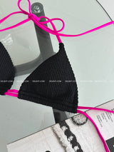 Hot pink colored string bikini