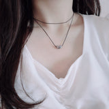 layered string necklace