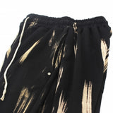 bleach side tuck string sweat pants