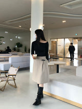 Ancient buckle midi skirt