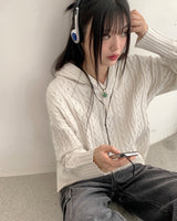 サッドツイストボタンセミジップアップフーディー長袖ニット