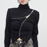 Seri's zip-turtleneck knitwear