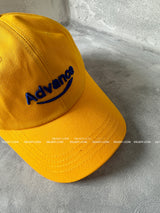 Yellow lettering ball cap
