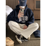 Nus. × HUKE フードTシャツ