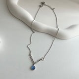 bi サージカルスチールブルーキャットアイコインハートキッチュネックレス / bi Surgical Steel Blue Cats Eye Coin Heart Kitch Necklace