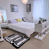 Black & white oval square tufting rug