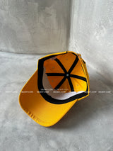 Yellow lettering ball cap