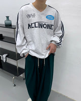 Vネックフットボールスウェットシャツ