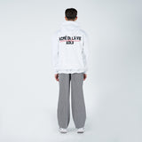 カーシブロゴフーディー / CURSIVE LOGO HOODIE WHITE