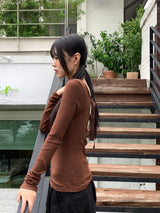 タティンバックバックルストラップスリット長袖Tシャツ